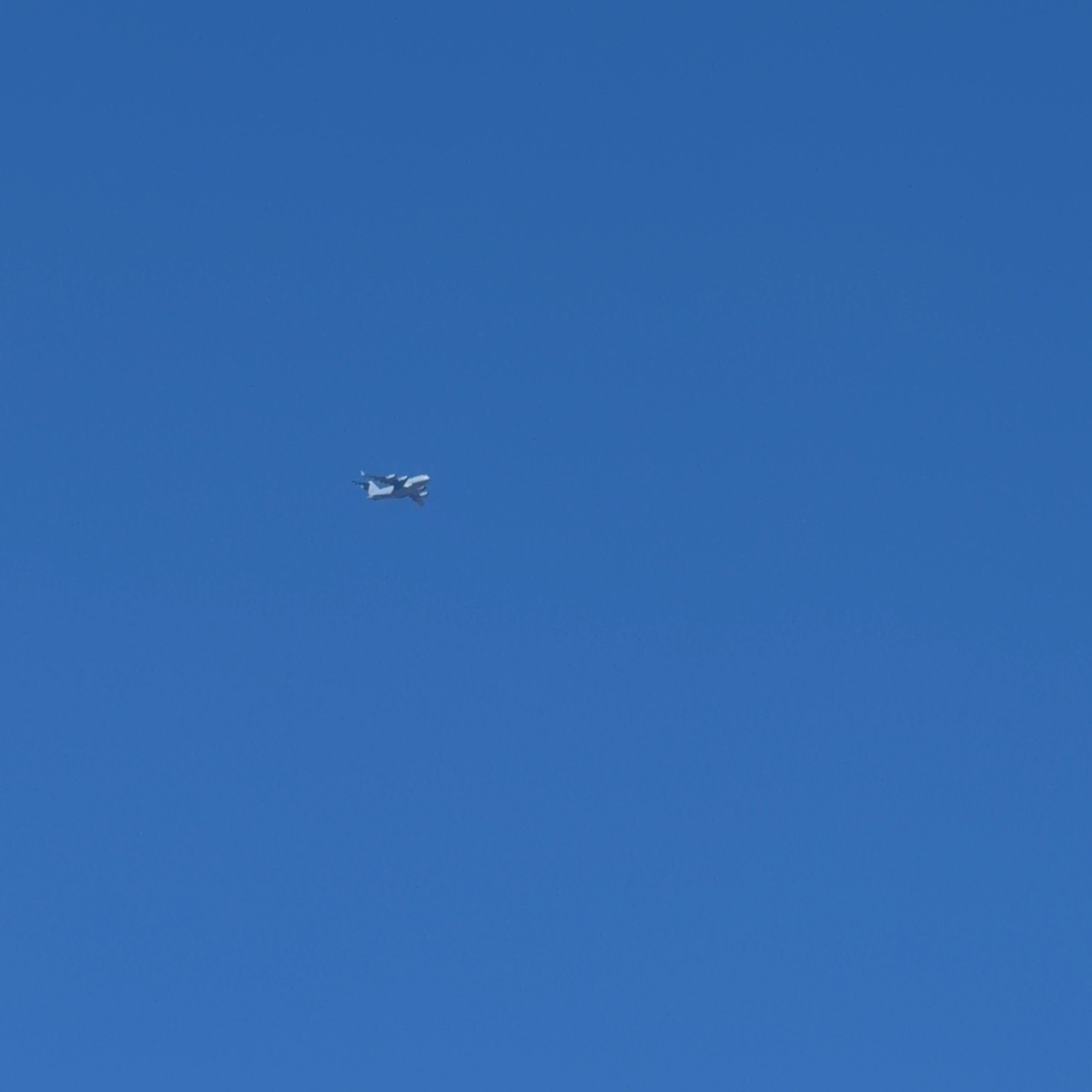 Boeing C-17A Globemaster III 99-0058 flying over Superior, Colorado, identified by ADS-B